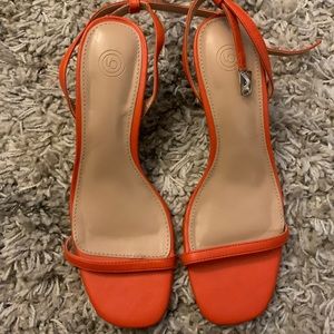 Low heels, Urban Outfitters. Size 7. Orange. Brand new, never worn.